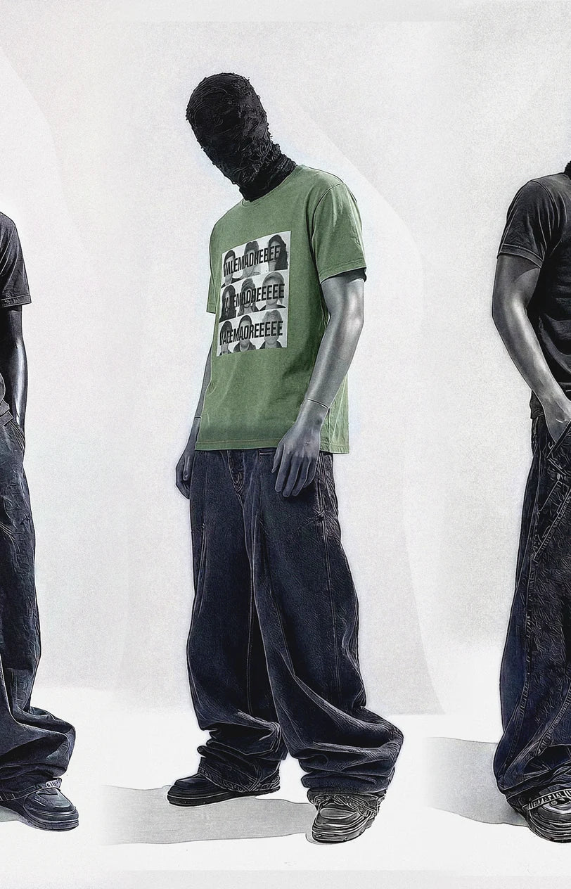 Masked figure in VALEMADRE drop 001, front, green tee