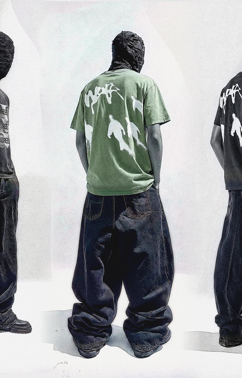 Masked figure in VALEMADRE drop 001, back, green tee